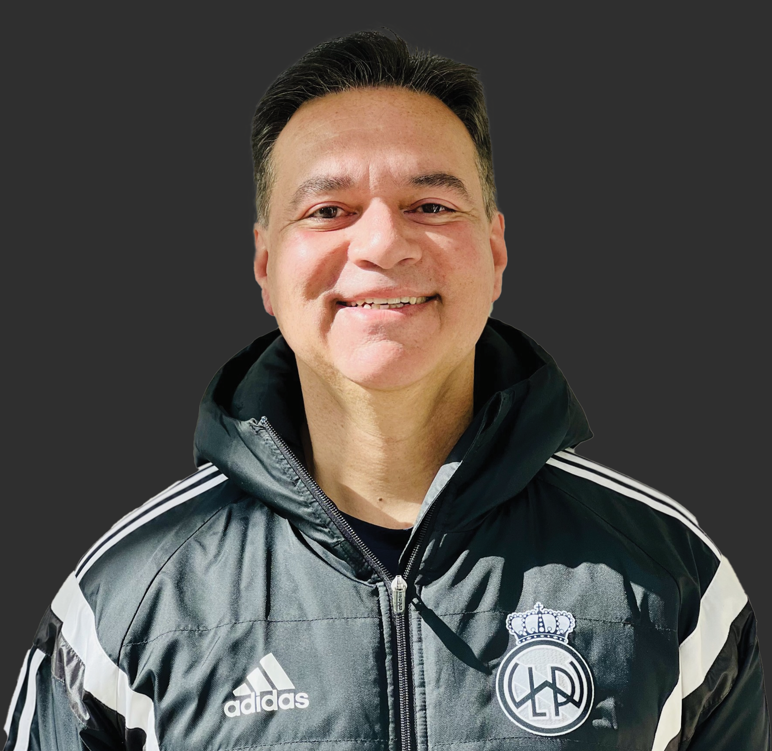 Thumbnail image of Alex Pombo wearing a club Adidas jacket with club logo