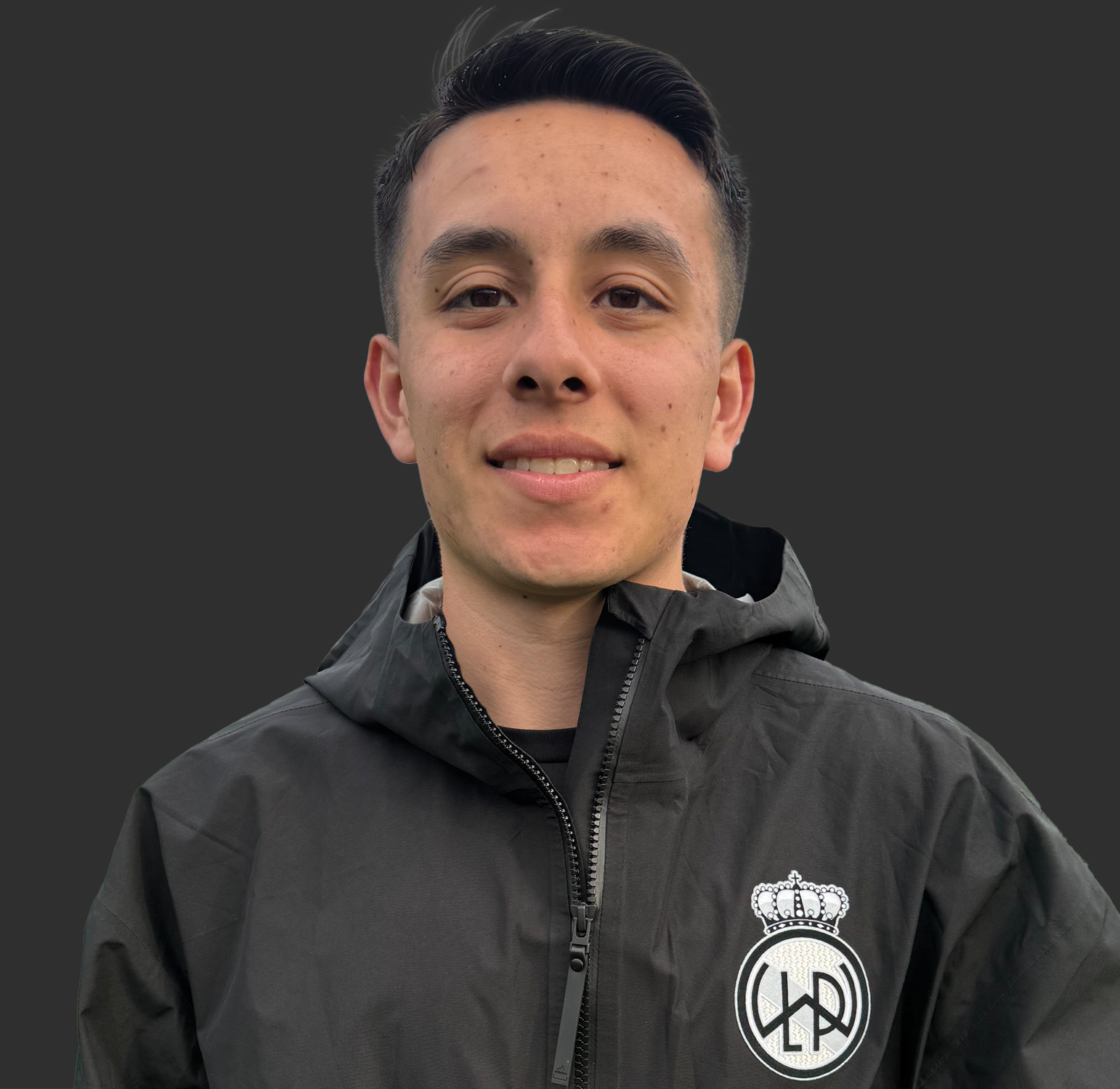 aThumbnail image of Alegandro Nambo wearing a club Adidas jacket with club logo