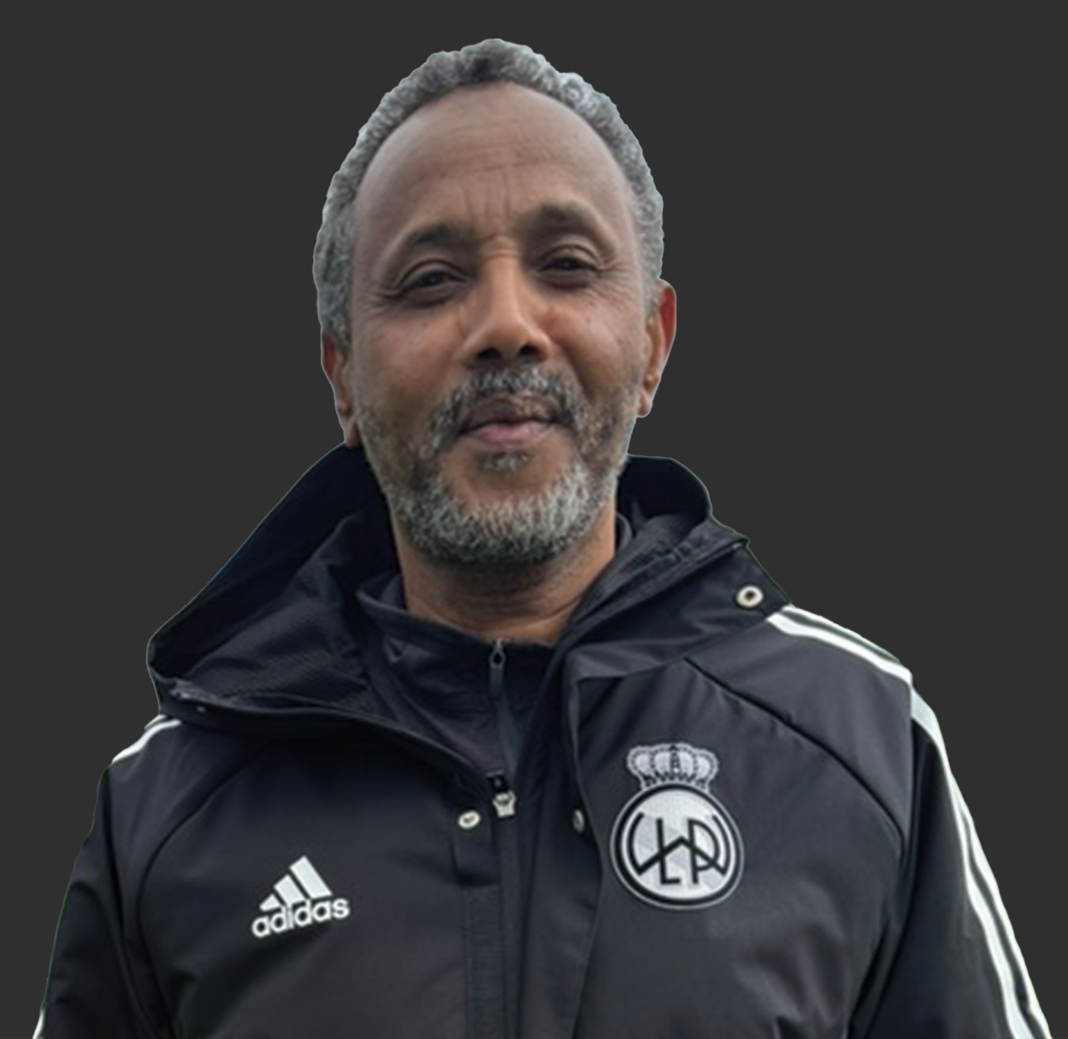 Thumbnail image of Amar Osman wearing a club Adidas jacket with club logo