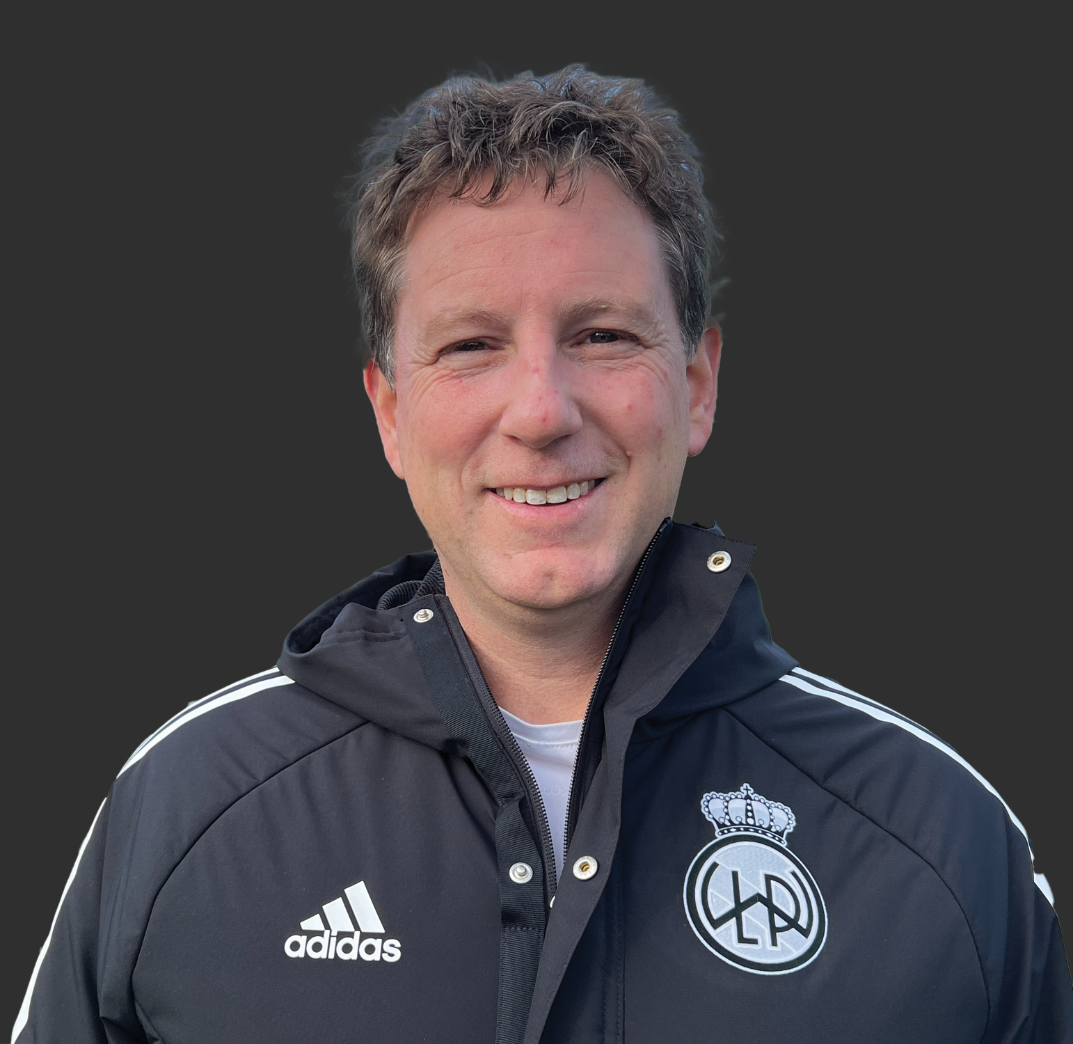 Thumbnail image of Neil Beam wearing a club Adidas jacket with club logo