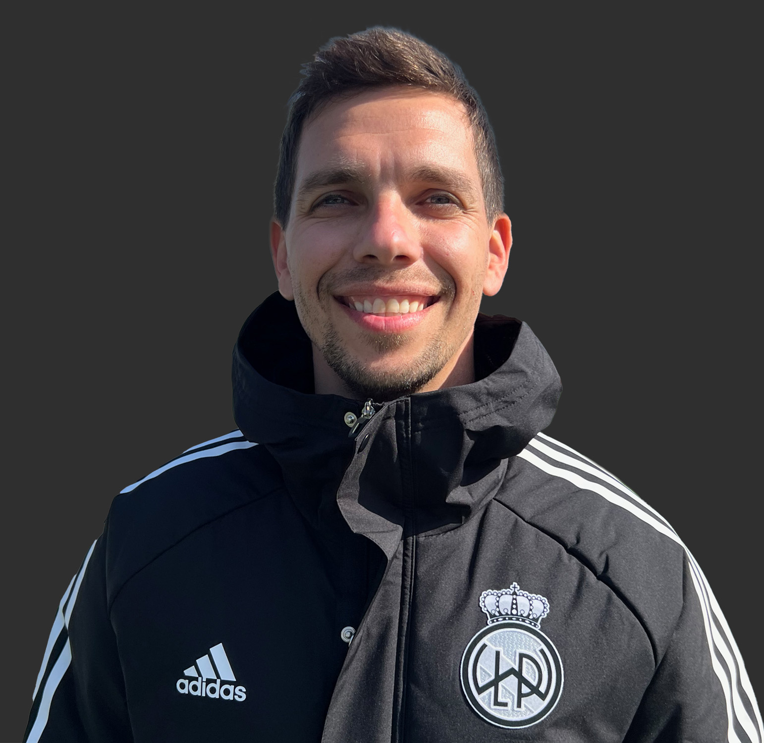 Thumbnail image of Roman Spektor wearing a club Adidas jacket with club logo